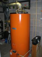 Gas fired water storage vessel